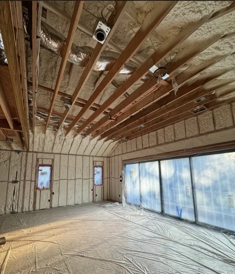 Interior walls and ceiling insulated with spray foam during new construction in Templeton
